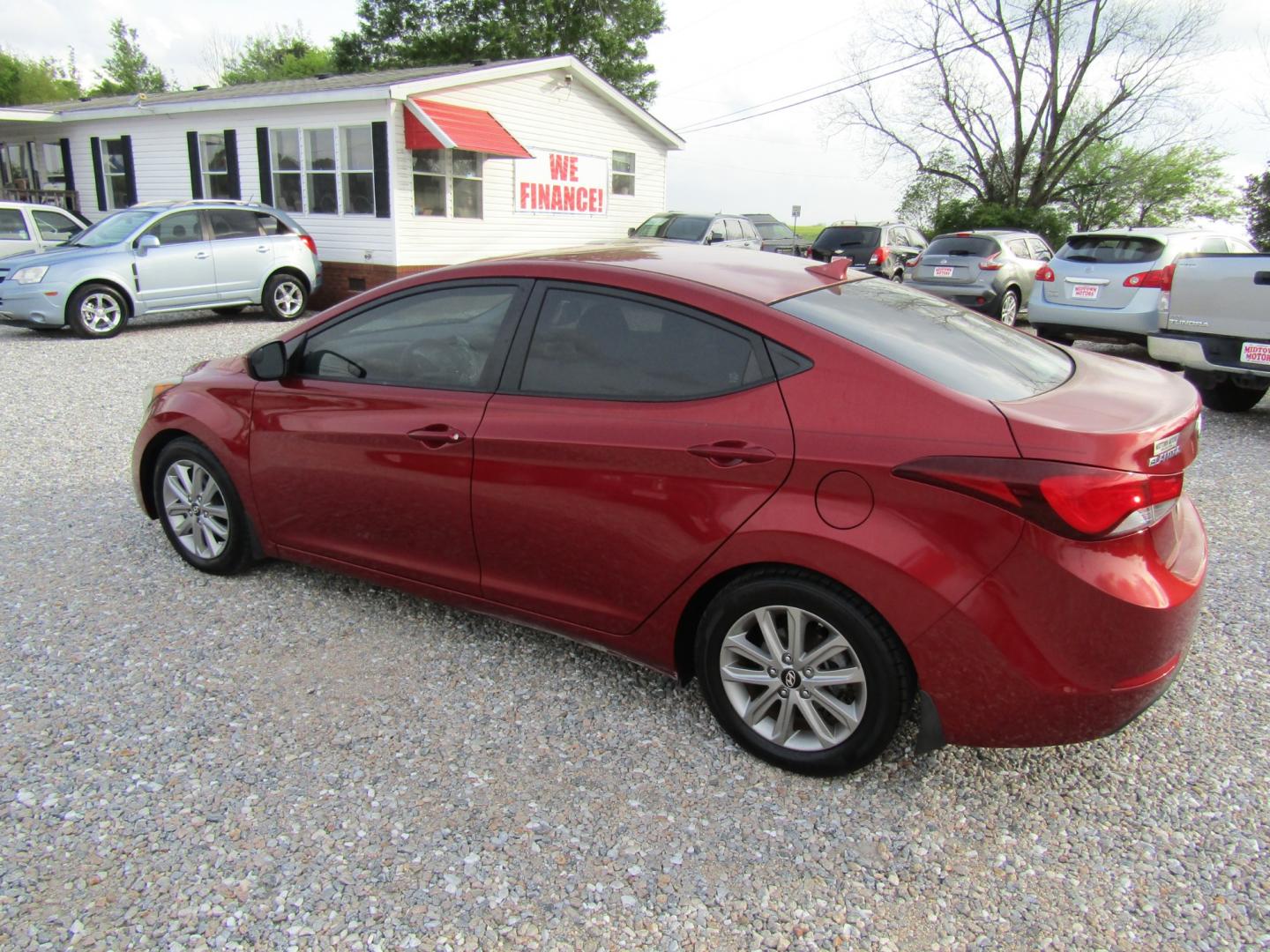 2016 Red /Gray Hyundai Elantra Limited (5NPDH4AE2GH) with an 1.8L L4 DOHC 16V engine, Automatic transmission, located at 15016 S Hwy 231, Midland City, AL, 36350, (334) 983-3001, 31.306210, -85.495277 - Photo#5